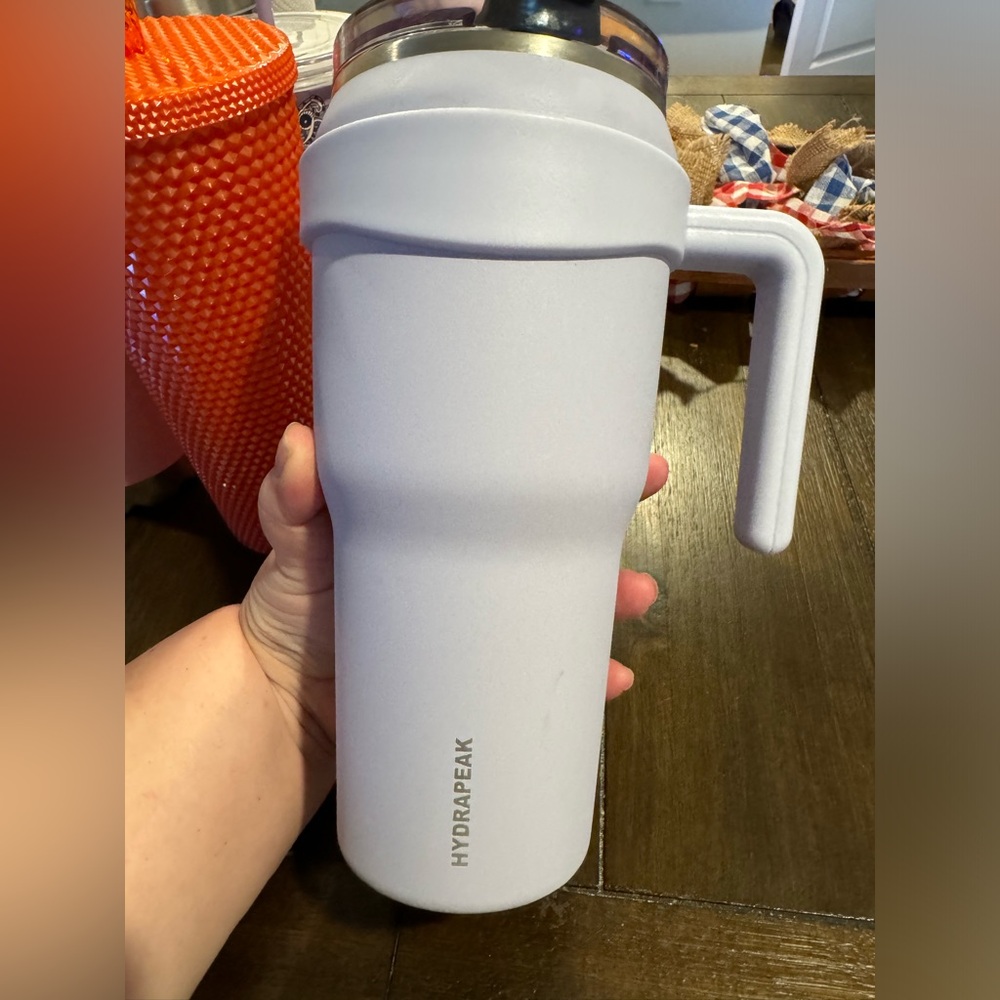 Purple tumbler with pop up straw